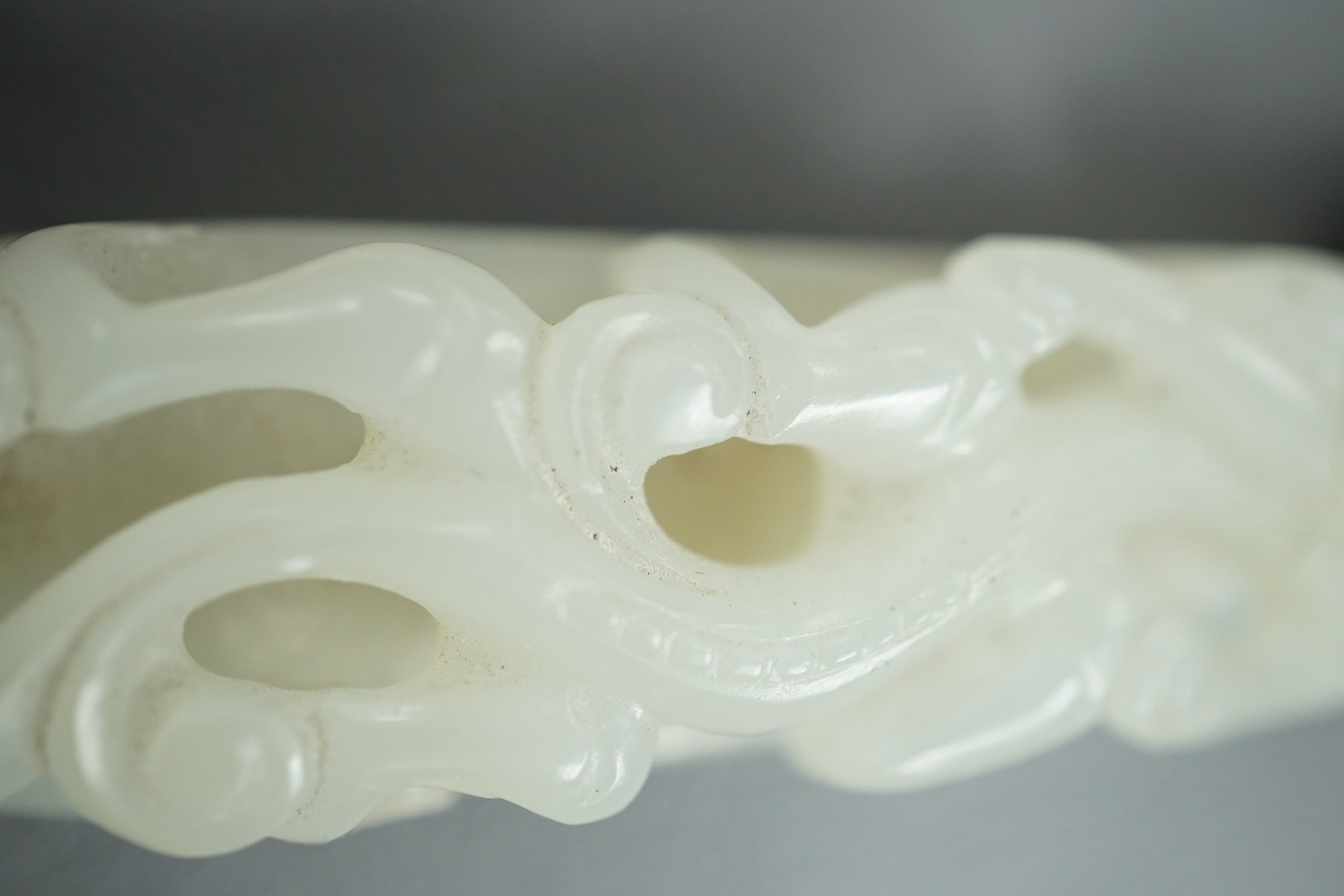 A Chinese jade and cabochon mounted hand mirror, the jade 18th/19th century
